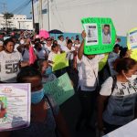 Varias personas marchan para exigir justicia por sus familiares y amigos desaparecidos, el 30 de julio de 2022, en Cancún (México). EFE/Alonso Cupul