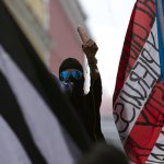 Una persona grita consignas por un megáfono durante una protesta contra la compañía eléctrica en San Juan (Puerto Rico). Imagen de archivo. EFE/ Thais Llorca