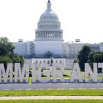 Fotografía de archivo de la palabra "Inmigrantes" instalada durante una conferencia de prensa por el décimo aniversario de la promulgación del programa Acción Diferida para los Llegados en la Infancia (DACA), celebrada cerca del edificio del Congreso en Washington (Estados Unidos). EFE/ Lenin Nolly