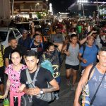 Migrantes caminan en caravana este domingo, en la ciudad de Tapachula en el estado de Chiapas (México).  EFE/Juan Manuel Blanco