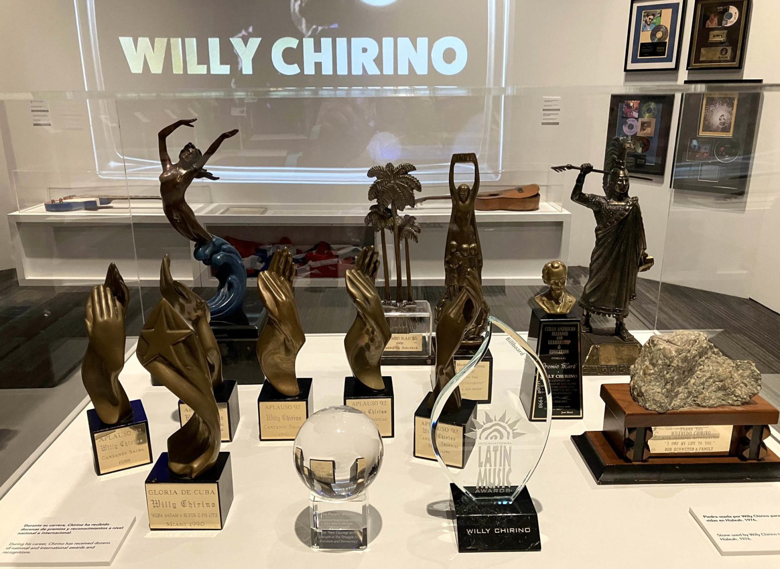 Fotografía de algunos de los premios ganados por el cantante cubano estadounidense Willy Chirino a lo largo de su carrera, mostrados durante la exposición "Willy Chirino: 50 años de música" hoy miércoles en el Museo de Historia en Miami, Florida (EEUU). EFE/Ana Mengotti