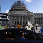 Varias personas participan en una manifestación contra la empresa eléctrica LUMA en San Juan (P.Rico). Imagen de archivo. EFE/ Thais Llorca