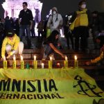 Fotografía de archivo de activistas que participan en una “velada por la paz”, en protesta contra la reforma que militariza la Guardia Nacional, en Ciudad de México (México). EFE/Mario Guzmán