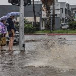 Vista de una calle inundada tras el paso de la tormenta Hilary, en Tijuana (México). EFE/Joebeth Terriquez