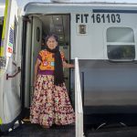 La señora Isabel Santiago Gómez, originaria de la región del Istmo, es la primera pasajera en abordar para el recorrido inaugural del tren de pasajeros del Corredor Interoceánico del Istmo de Tehuantepec hoy, en el municipio de Salina Cruz (México). EFE/Luis Villalobos