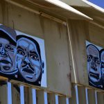 Fotografía del 22 de agosto de 2024 de un mural con rostros de veteranos de guerra deportados, en el muro fronterizo de la ciudad de Tijuana en Baja California (México). EFE/Joebeth Terríquez