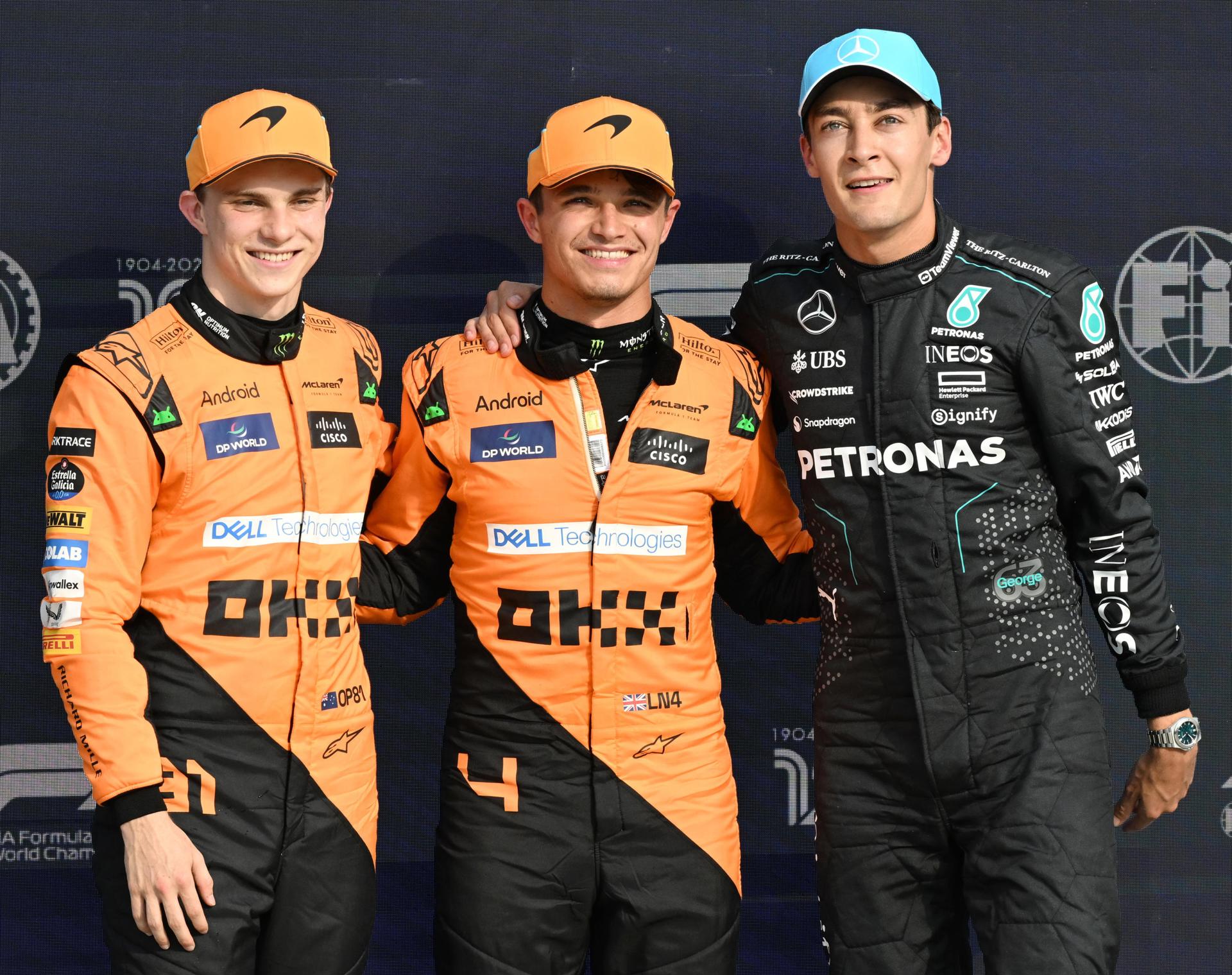 Oscar Pistri, Lando Norris y George Russell (i-d), tras la clasificación del Gran Premio de Italia de F1. EFE/EPA/Daniel Dal Zennaro
