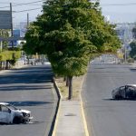 Fotografía de archivo de vehículos calcinados tras los enfrentamientos de fuerzas federales con grupos armados, en la ciudad de Culiacán, estado de Sinaloa (México). EFE/Juan Carlos Cruz