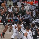 Cam Thomas (i) de los Brooklyn Nets lanza a canasta ante los Milwaukee Bucks durante un partido de la NBA en el Barclays Center de Nueva York (Estados Unidos). EFE/ Angel Colmenares