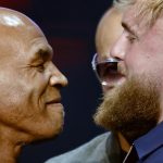 Imagen de archivo del exboxeador estadounidense Myke Tyson (i) y el boxeador y youtuber Jake Paul (d) en la rueda de prensa promocional de una pelea entre ellos, en el Teatro Apollo de Nueva York (Estados Unidos). EFE/ Peter Foley