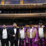 Los integrantes de los grupos de música regional mexicana Banda El Recodo (i) y la banda Machos posan durante una rueda de prensa este miércoles, en el Auditorio Telmex, en Guadalajara (México). EFE/ Francisco Guasco