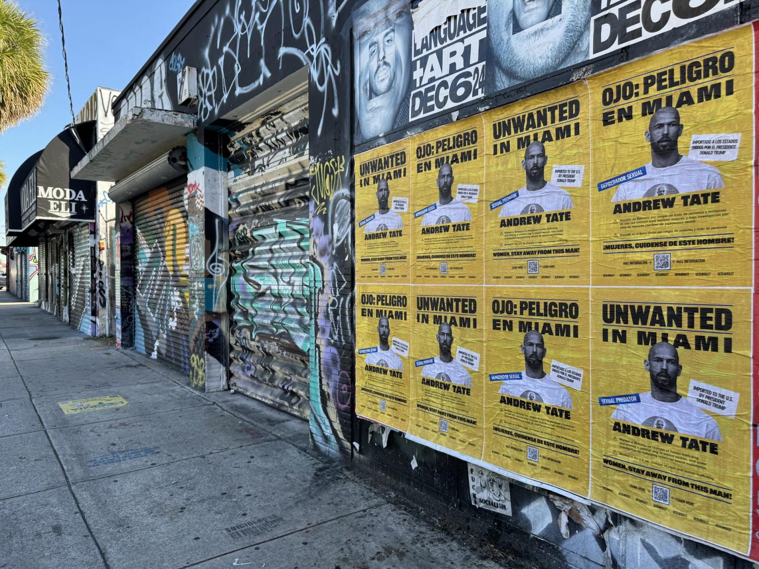 Fotografía cedida por Ricardo Ramírez donde se muestran carteles en inglés y español en los que se alerta a las mujeres de Miami sobre la presencia de Andrew Tate colgados en el área de la conglomerada Wynwood, en el centro de Miami, Florida (EE.UU.). EFE/Ricardo Ramírez /SOLO USO EDITORIAL NO VENTAS/SOLO DISPONIBLE PARA ILUSTRAR LA NOTICIA QUE ACOMPAÑA (CRÉDITO OBLIGATORIO)